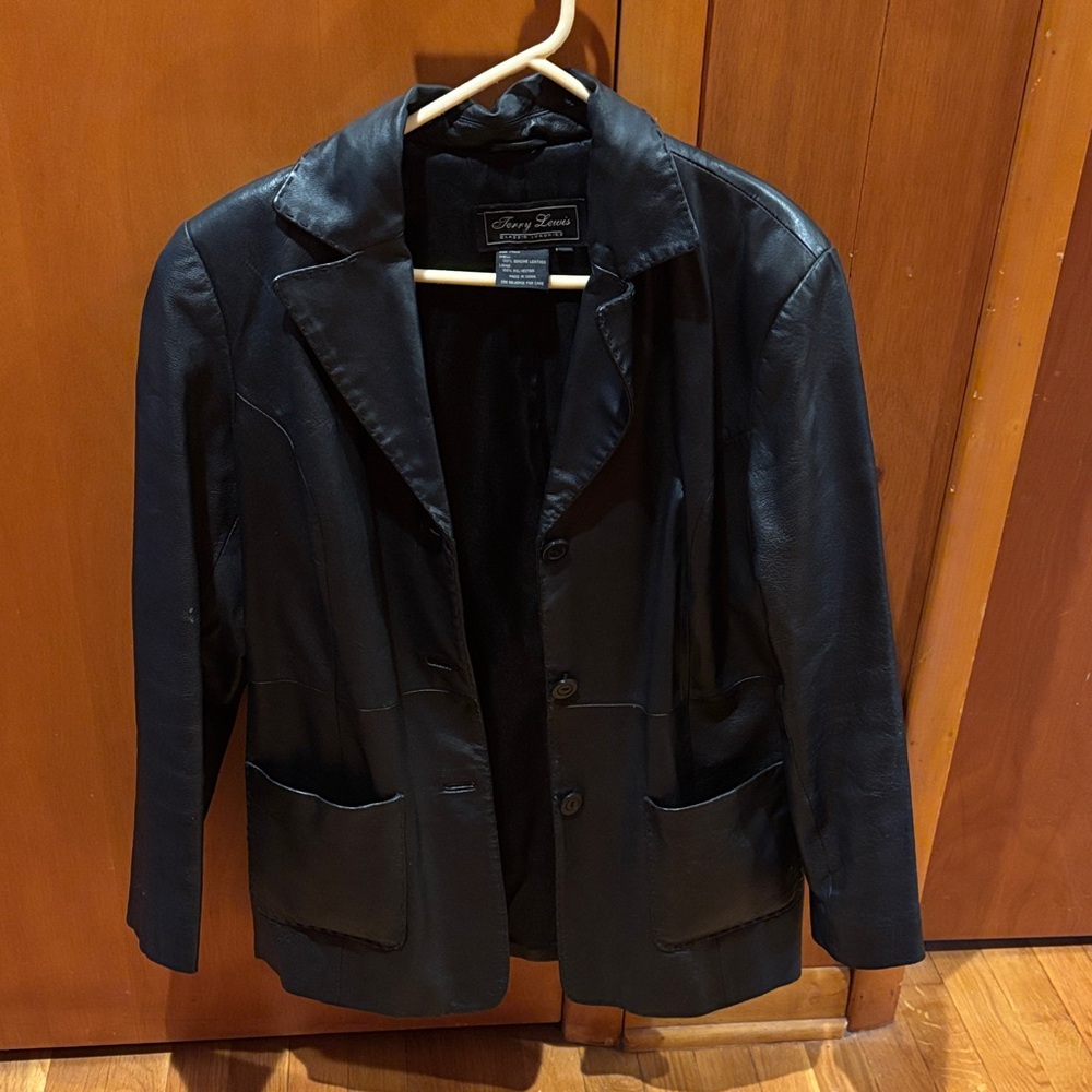 Terry Lewis Classic Luxuries Black Leather button up coat